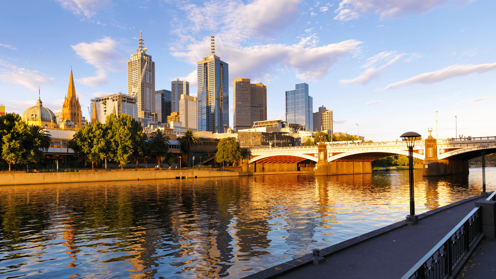 Melbourne city skyline at sunset viewed from the Yarra River – a prime location for property investment in Australia