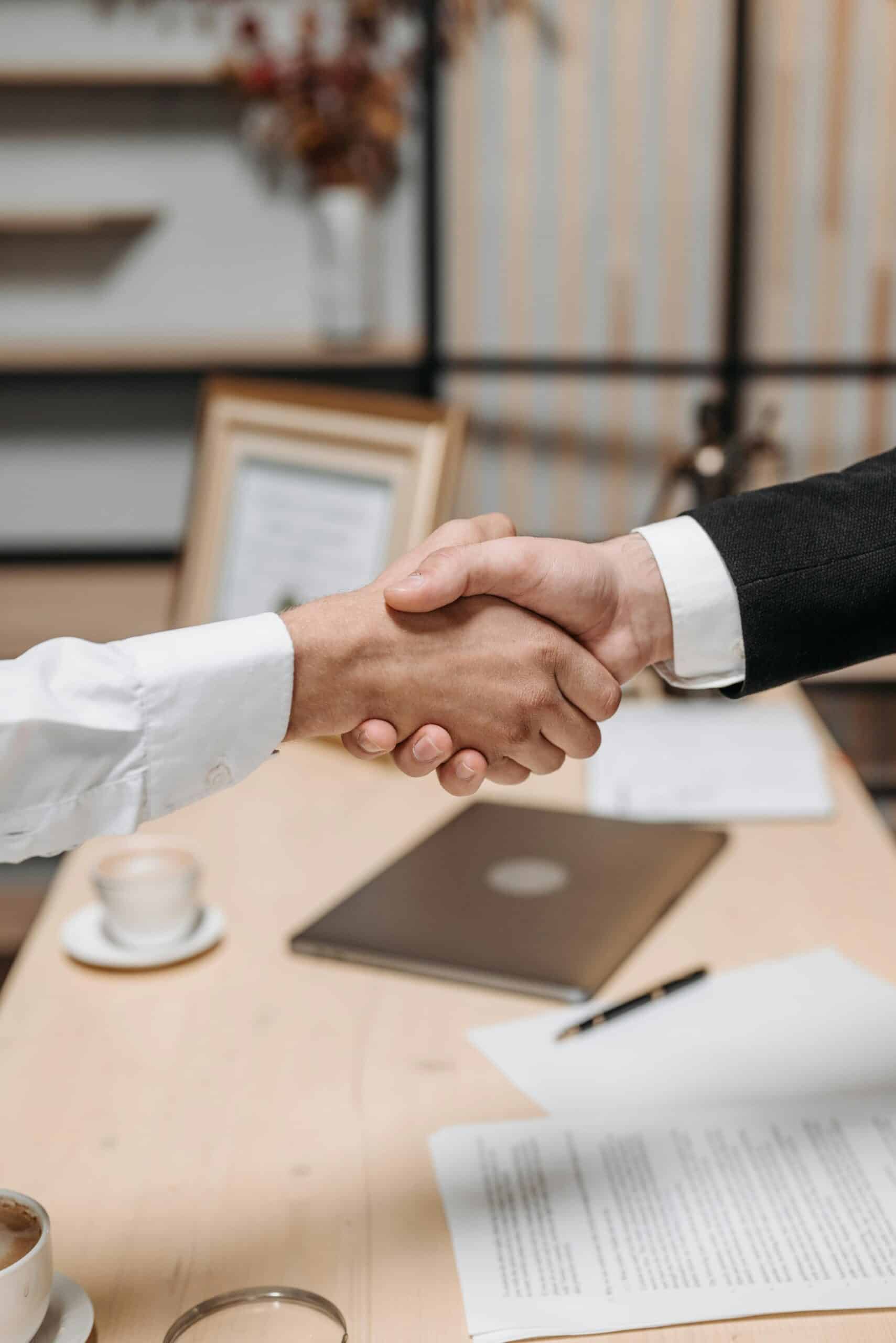 Successful property investment agreement handshake